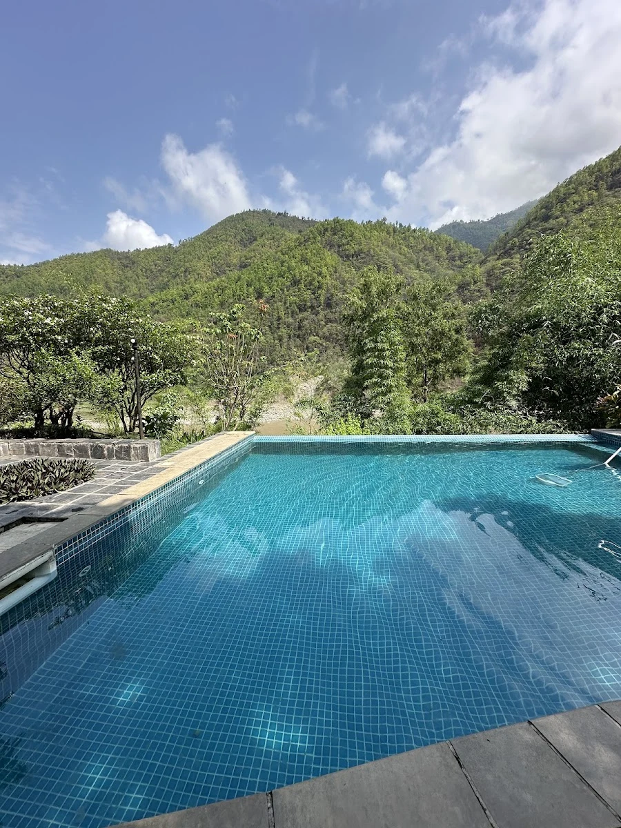 Swimming pool at Holy Himalaya Resort Kurintar in Darechok, Kurintar, Chitwan.